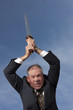 Businessman Attacking With A Sword