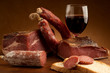 mix of parma prosciutto and salami with bread glass of wine mix of parma prosciutto and salami with bread glass of wine