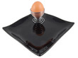 boiled egg on black plate