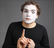 Foto: portrait of the mime isolated on grey background portrait of the mime isolated on grey background