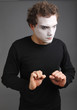 Foto: portrait of the mime isolated on grey background portrait of the mime isolated on grey background