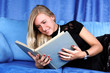 woman read book at home in sofa