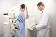 Doctor performing a mammography