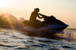 beautiful girl riding her jet skis