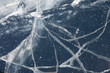 Spider web of tension cracks in thick layer of ice