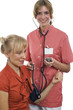 The nurse measures pressure at the patient