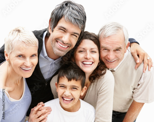Foto: Portrait of a cheerful boy with loving parents and grandparents Portrait of a cheerful boy with loving parents and grandparents