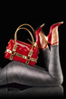 Red handbag and pumps.