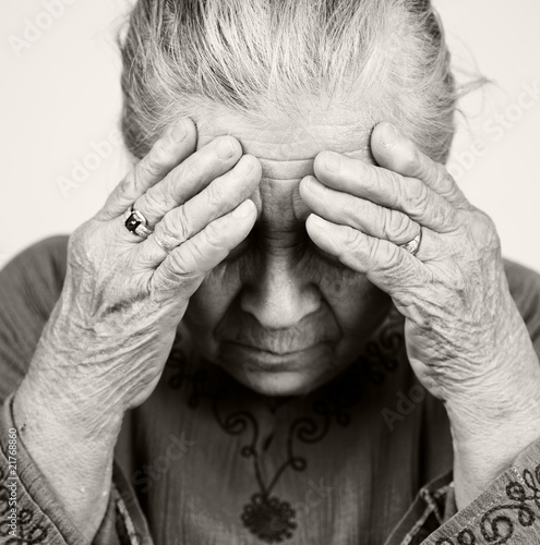 Photo: Sad old senior woman with health problems Sad old senior woman with health problems