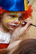 The boy wearing clown The boy wearing clown
