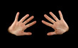 Hands isolated on black background.
