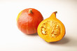 Whole and half Hokkaido squash