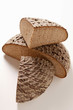 A loaf of farmhouse bread, halved and two quarters
