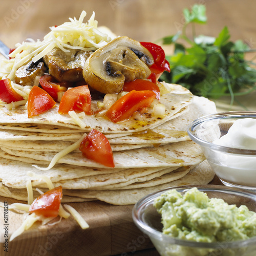 Photo: Fajitas with tomatoes, Portobello mushrooms & grated cheese Fajitas with tomatoes, Portobello mushrooms & grated cheese