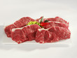 Five raw sirloin steaks