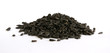 Photo: A handful of sunflower seeds, isolated on a white A handful of sunflower seeds, isolated on a white