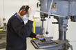 drilling machine and worker