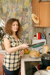woman cooking pancakes woman cooking pancakes