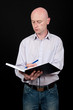 portrait male business man on black backdrop