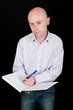portrait male business man on black backdrop