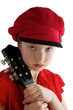 Photo: Little girl with red hat and guitar Little girl with red hat and guitar