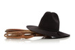 Black cowboy hat with lasso/lariat on white