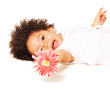 Cheerful little girl with a flower