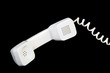White handset isolated on black