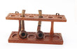 Foto: Old carved wooden pipe stand with pipes Old carved wooden pipe stand with pipes