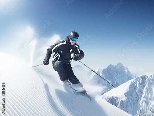 Photo: Skier in high mountains - alpen Skier in high mountains - alpen
