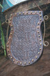 beautiful wooden sign in the form of a shield