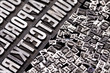 A mix of vintage letterpress characters