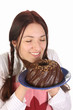 housewife smelling bundt cake