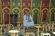 Man Sitting in an Arabian Tent Man Sitting in an Arabian Tent