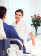 Foto: friendly nurse with patient in hospital friendly nurse with patient in hospital
