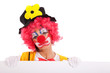 sad clown holding a banner