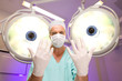 Surgeon with surgical gloves