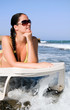 Beautiful young woman in the water