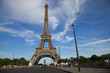 Eiffel Tower panoramic near sunset, with blurred people