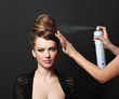 Hair spray, woman over black Hair spray, woman over black