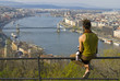Man enjoying Budapest from gellert hill Man enjoying Budapest from gellert hill