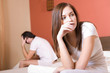 Girl and boy on bed