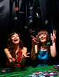 Young people have a good time in casino.