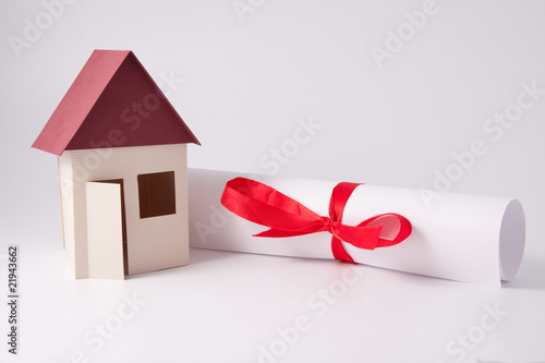 Photo: House model with document House model with document