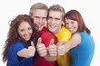 young people showing thumbs up