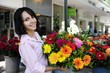 Photo: woman with huge bouquet of flowers outdoors woman with huge bouquet of flowers outdoors