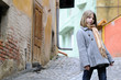young tourist on medieval city streets