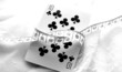 playing card ten and measuring tape