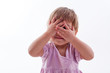 the girl closed her eyes with her hands on white