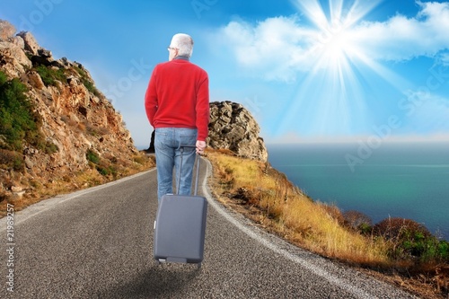 Photo: Adult man travelling for holidays Adult man travelling for holidays